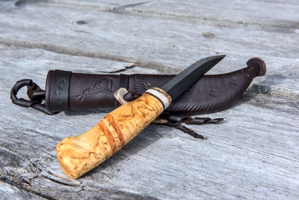 Knife with wooden handle and leather sheath