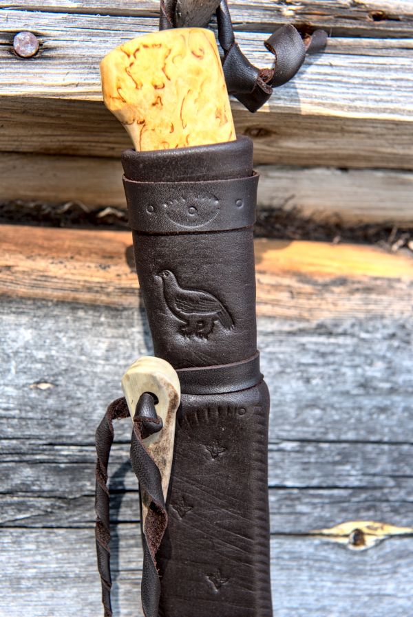 Knife with wooden handle and leather sheath