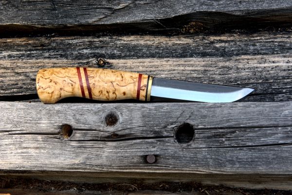 Knife with wooden handle and leather sheath
