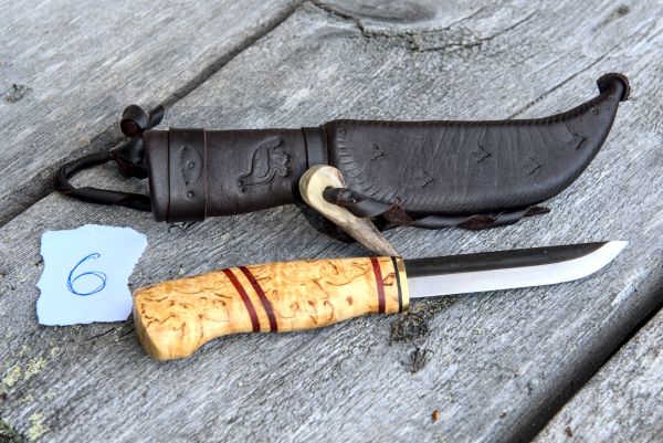 Knife with wooden handle and leather sheath