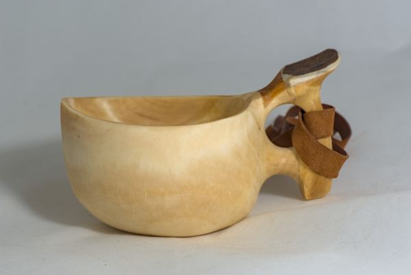 wooden cup with leather strap