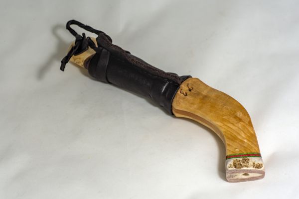 Knife with wooden handle and sheath made from wood and leather
