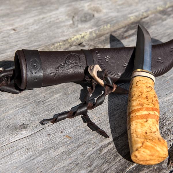 Knife with wooden handle and leather sheath