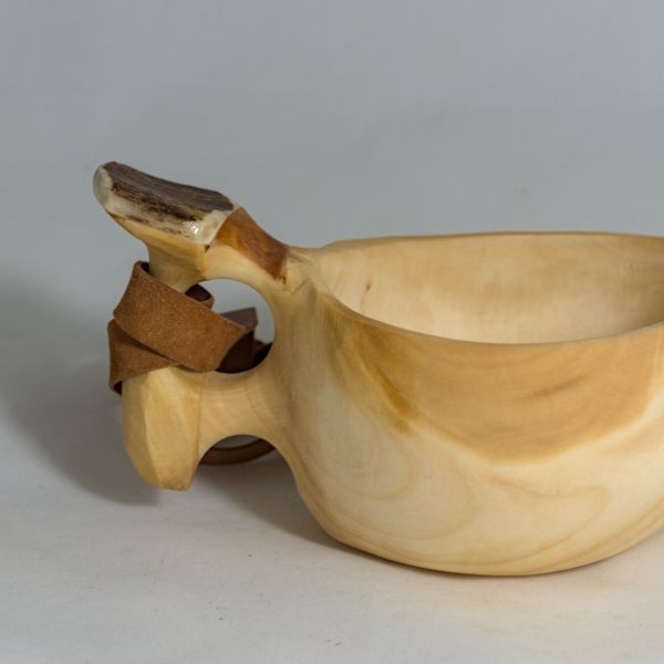 wooden cup with leather strap