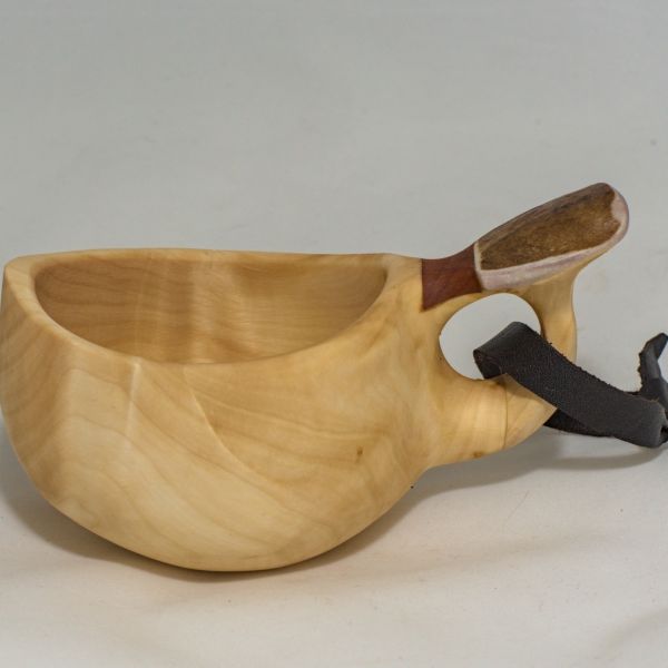 wooden cup with leather strap