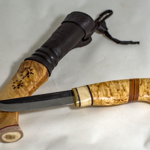 Knife with wooden handle and sheath made from wood and leather